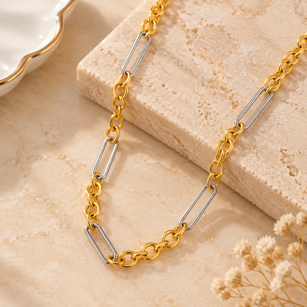 Gold and silver paperclip chain necklace with stainless steel geometric link design