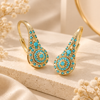 Multicolor crystal drop earrings with gold-tone design and turquoise crystal details