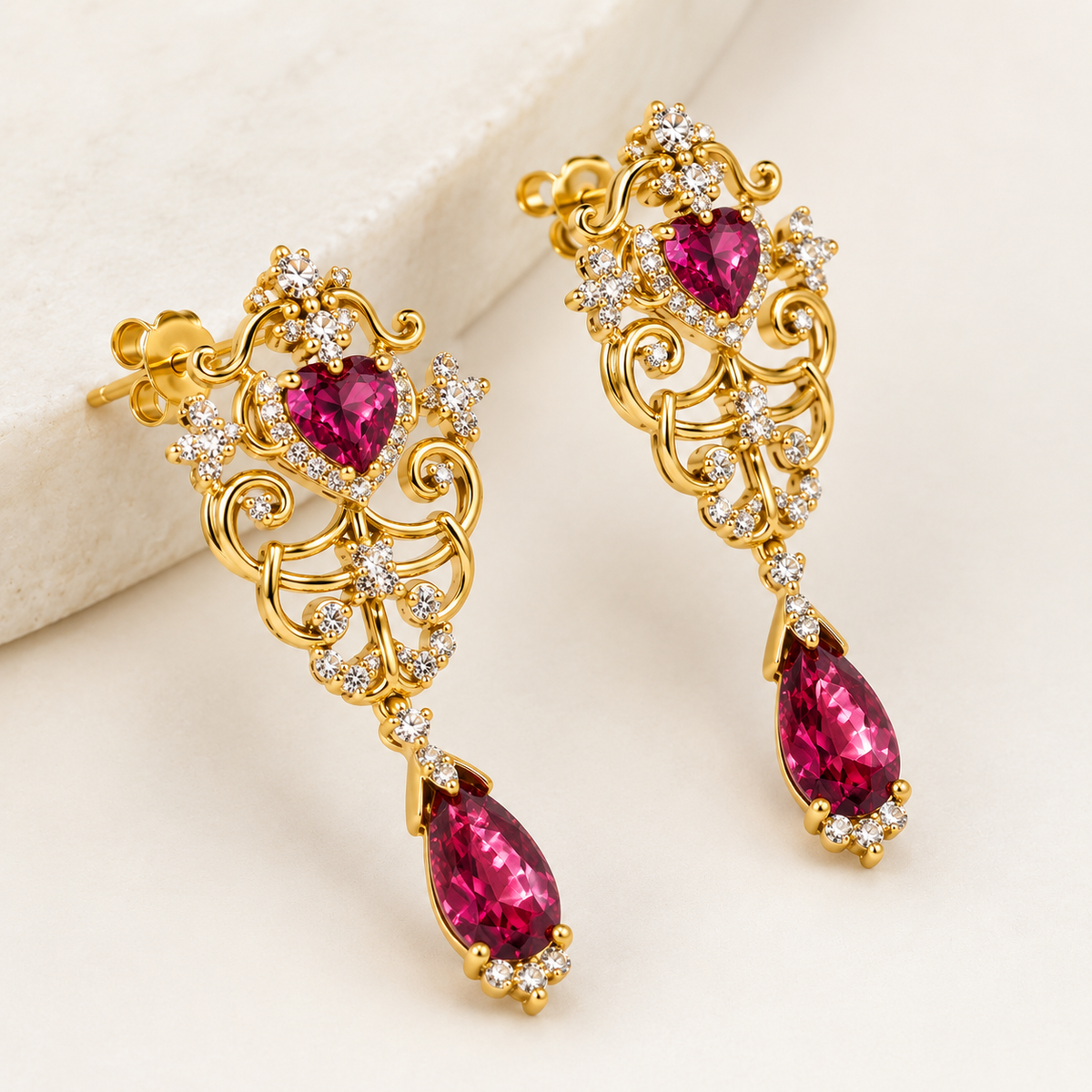 Woman wearing vintage heart crystal dangle earrings with statement fashion design